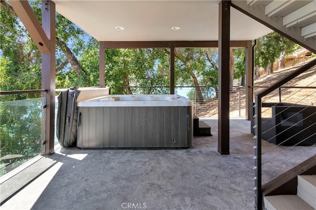 view of patio / terrace featuring a hot tub