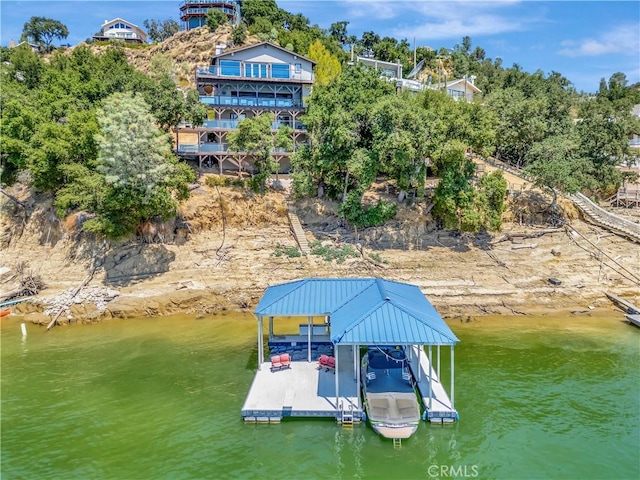 dock area with a water view