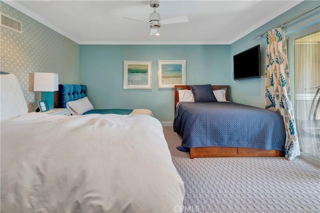 bedroom with carpet flooring, ceiling fan, and ornamental molding