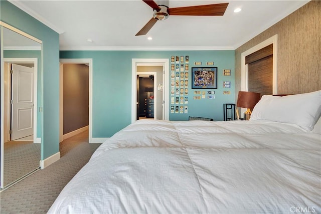 bedroom featuring carpet floors, a closet, ceiling fan, and ornamental molding