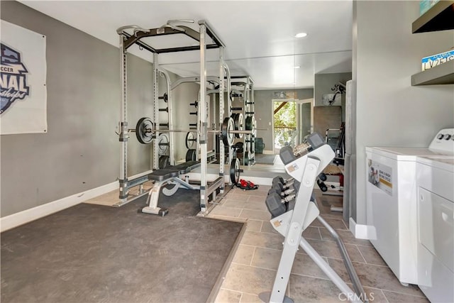 workout area with washer and dryer