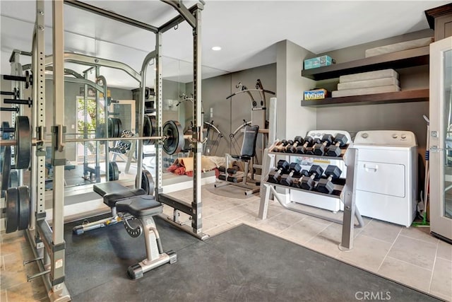 gym featuring washer / dryer