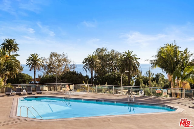 view of pool with a patio area