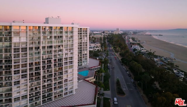 view of outdoor building at dusk