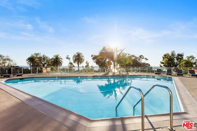 view of pool featuring a patio area