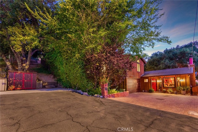 view of front of property with a garage