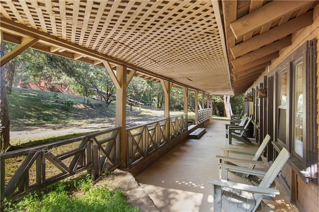 view of patio featuring a porch