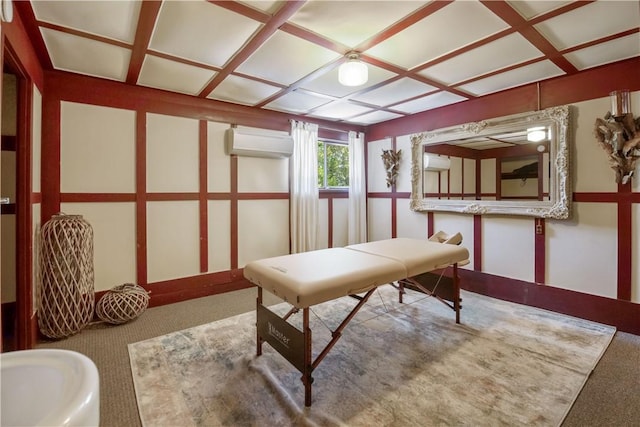 playroom featuring carpet, an AC wall unit, and coffered ceiling