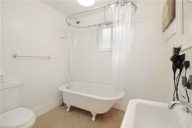 bathroom featuring sink and toilet