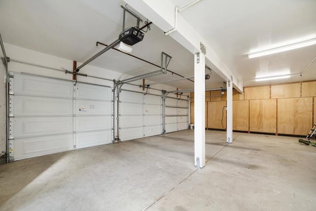 garage featuring a garage door opener