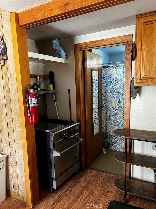 97390 Dome View Ave, Kennedy Meadows, CA 93527 - kitchen featuring wood finished floors and brown cabinetry
