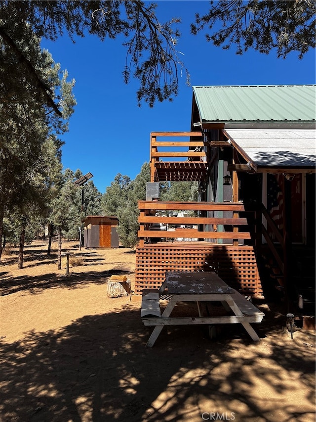 exterior space featuring a storage shed