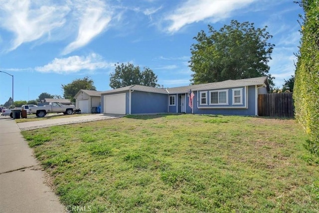 ranch-style house with a front lawn and a garage