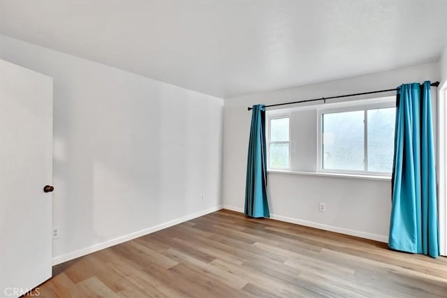 empty room featuring light hardwood / wood-style flooring