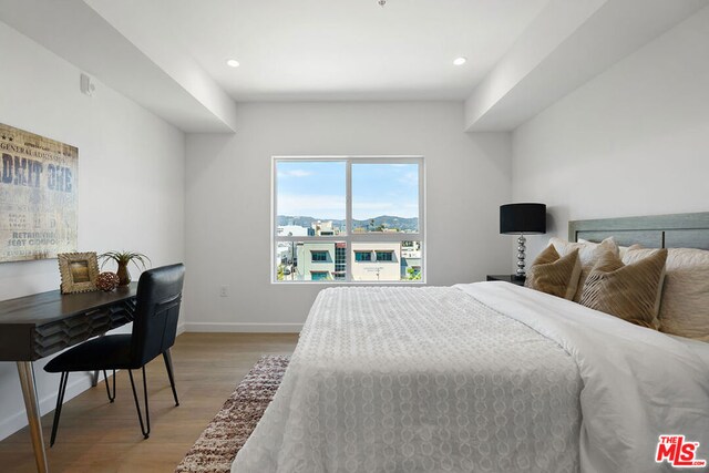 bedroom featuring light hardwood / wood-style flooring