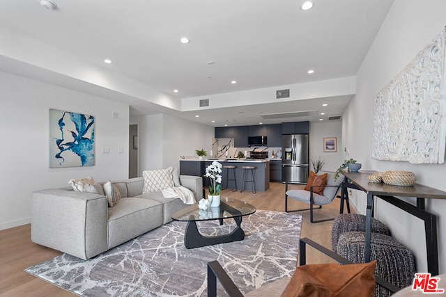 living room with light wood-type flooring