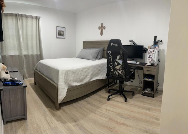 bedroom featuring light hardwood / wood-style floors