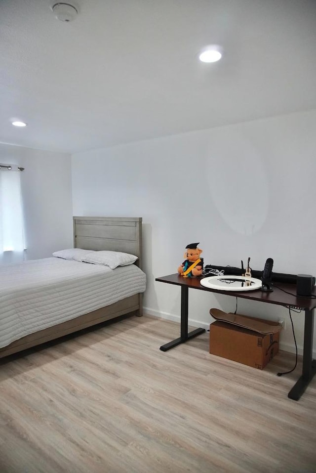 bedroom featuring light hardwood / wood-style flooring