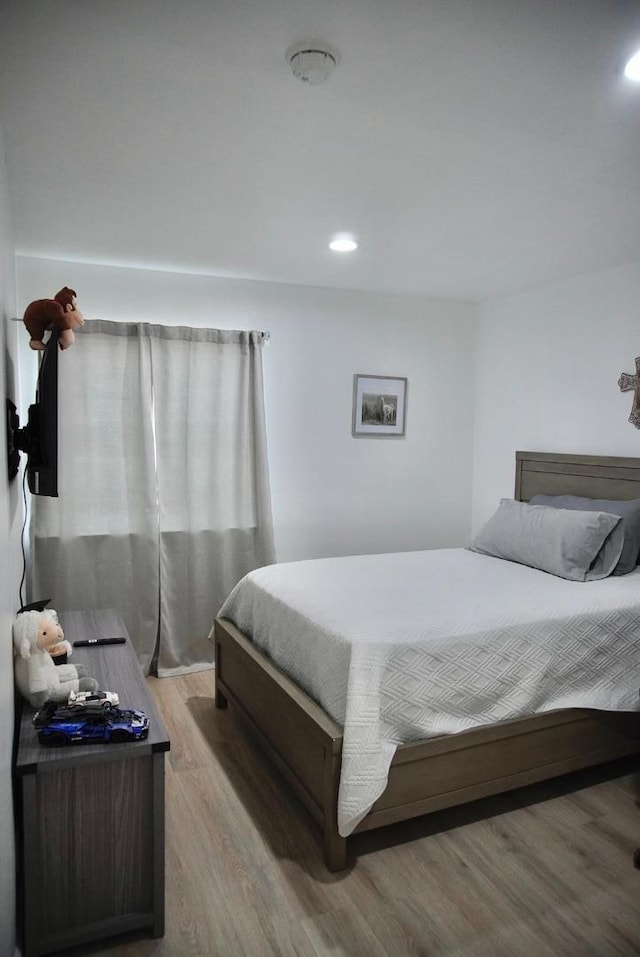 bedroom featuring light hardwood / wood-style flooring