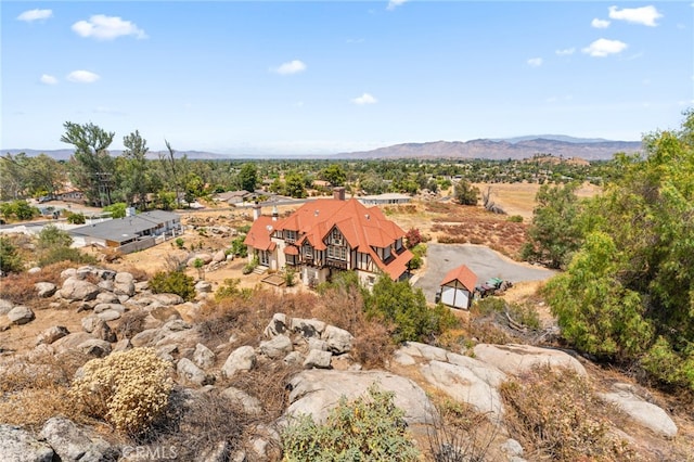 bird's eye view with a mountain view