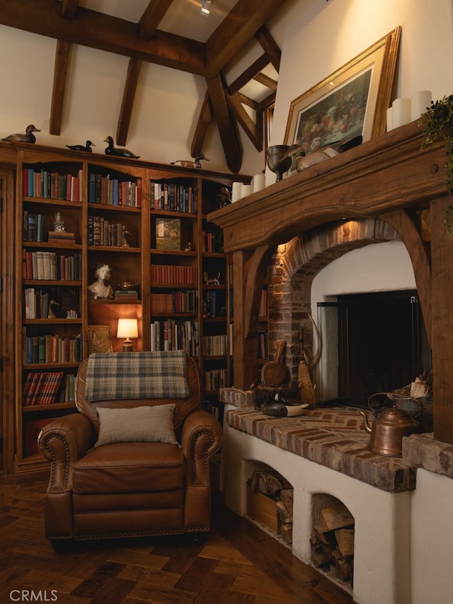 sitting room with beamed ceiling