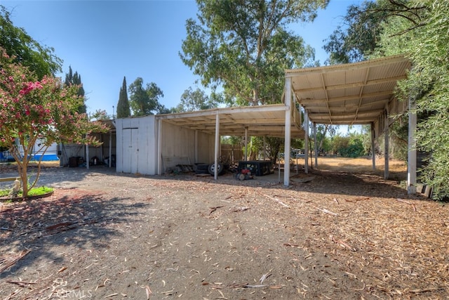 view of car parking featuring a carport