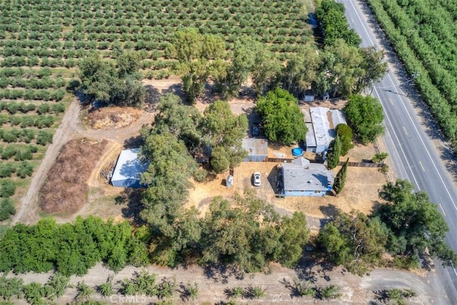 birds eye view of property featuring a rural view