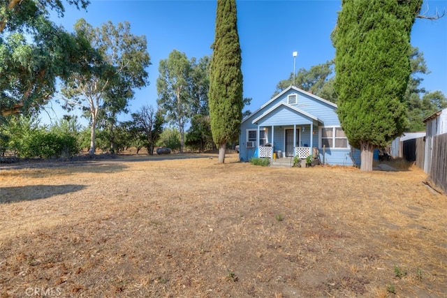 view of yard with covered porch