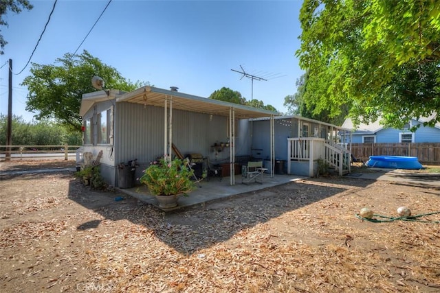 back of house featuring a patio area