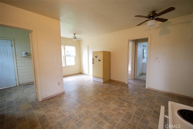 4065 County Rd S, Orland, CA 95963 - empty room featuring ceiling fan and baseboards