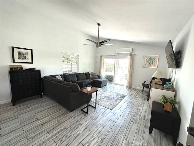 living room featuring vaulted ceiling, a wall mounted AC, light hardwood / wood-style flooring, and ceiling fan