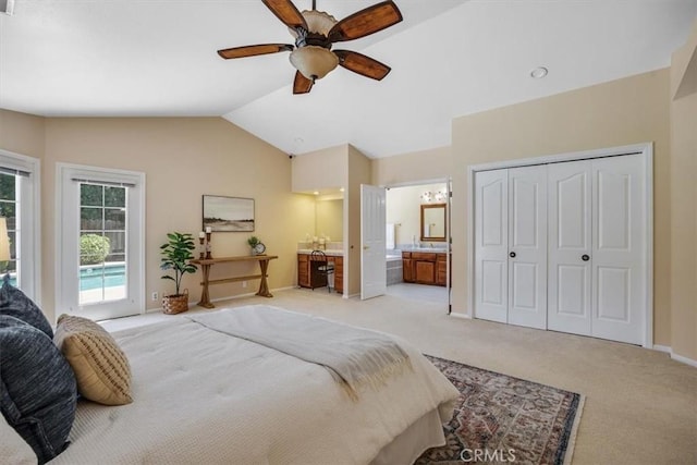 bedroom with connected bathroom, light carpet, lofted ceiling, access to exterior, and ceiling fan with notable chandelier