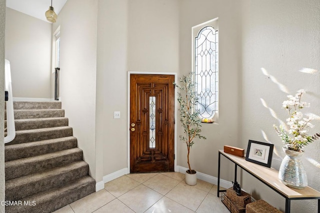 entrance foyer featuring light tile patterned floors