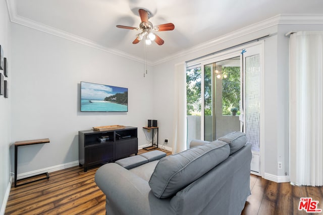 living room with ceiling fan, dark hardwood / wood-style flooring, and ornamental molding