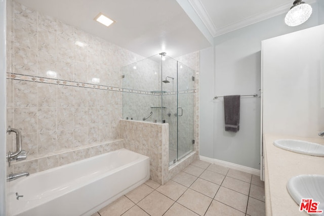 bathroom with tile patterned floors, vanity, separate shower and tub, and crown molding