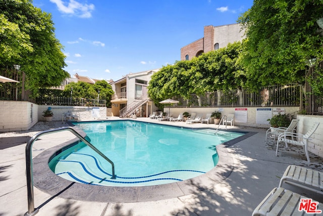 view of pool with a patio