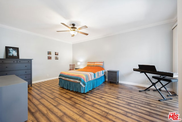 bedroom with ceiling fan, crown molding, and dark wood-type flooring