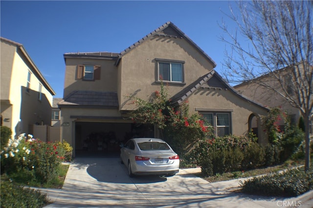 view of front of property featuring a garage