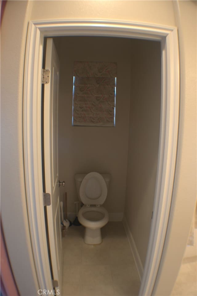 bathroom featuring toilet