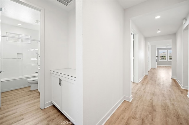 hall featuring light hardwood / wood-style flooring