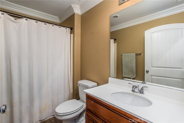 bathroom featuring ornamental molding, a shower with shower curtain, vanity, and toilet