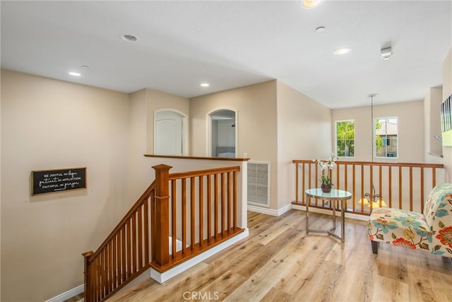 hall with light wood-type flooring