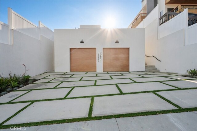 exterior space with a garage