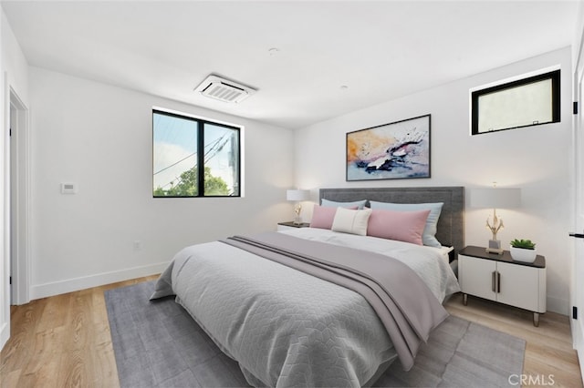 bedroom featuring light wood-type flooring