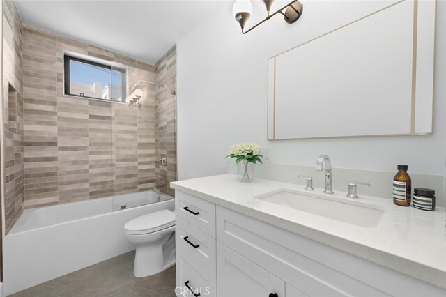 full bathroom with vanity, toilet, tile patterned floors, and tiled shower / bath