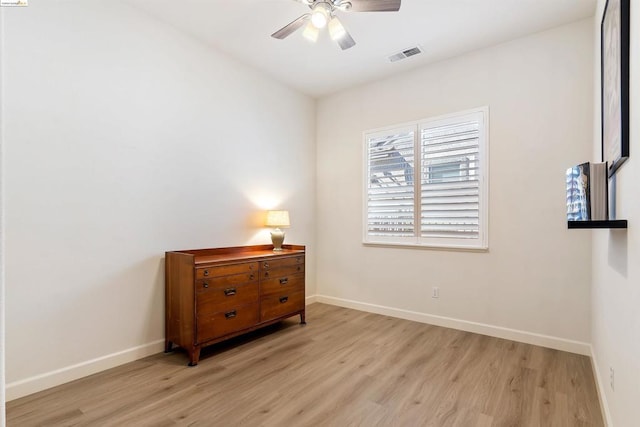 bedroom featuring ceiling fan and light hardwood / wood-style flooring