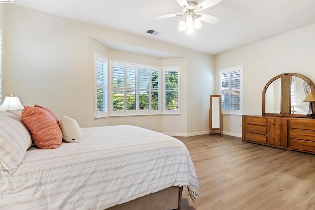 bedroom featuring ceiling fan and light wood-type flooring