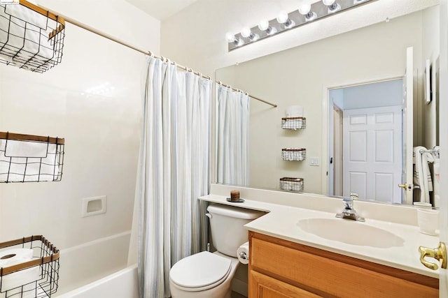 full bathroom featuring toilet, vanity, and shower / bath combination with curtain