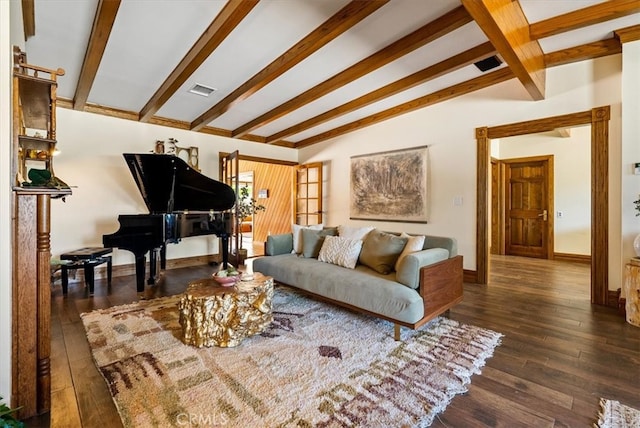 living room with lofted ceiling with beams and dark hardwood / wood-style flooring