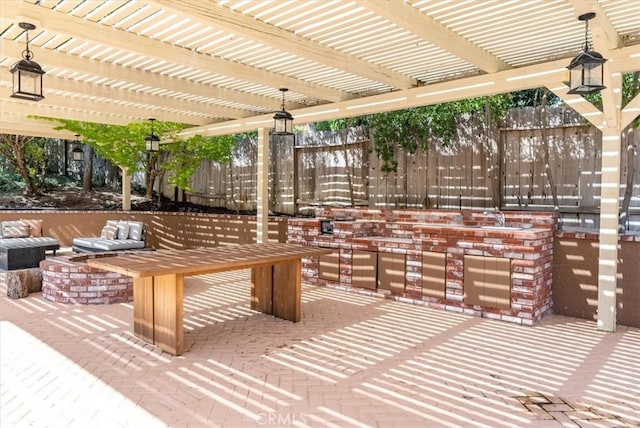 view of patio / terrace featuring a pergola